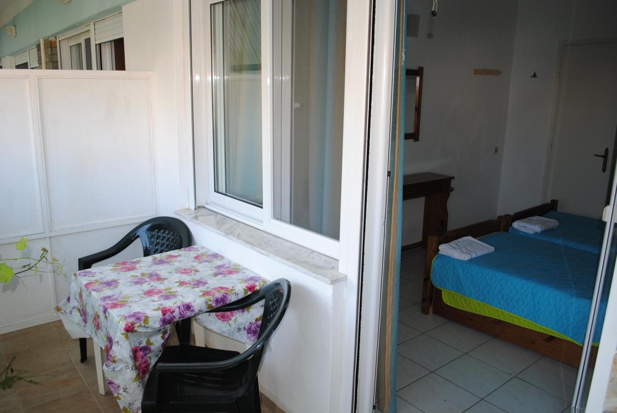 Artemis Apartments Paralia Dionysiou Ruang foto