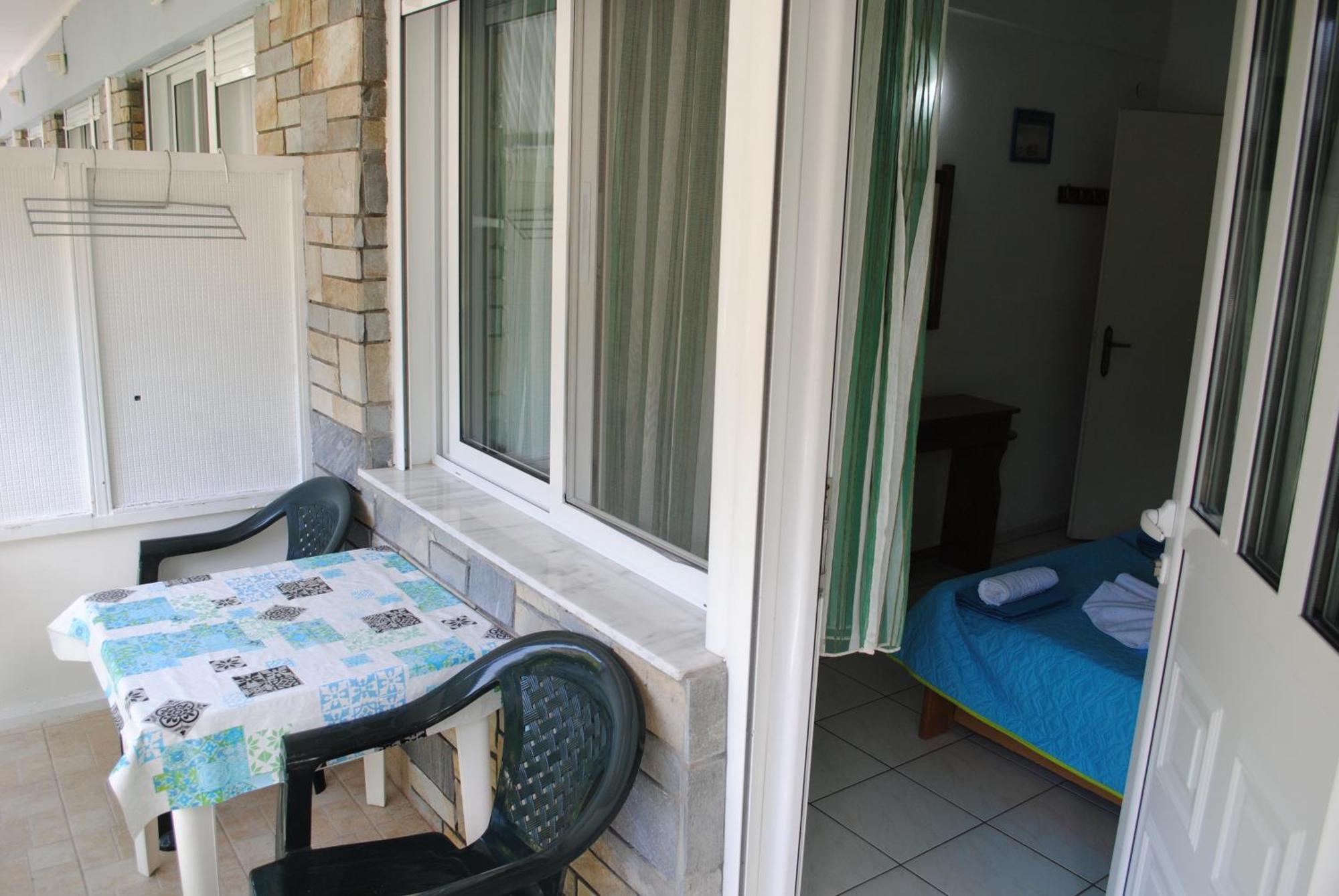 Artemis Apartments Paralia Dionysiou Bagian luar foto