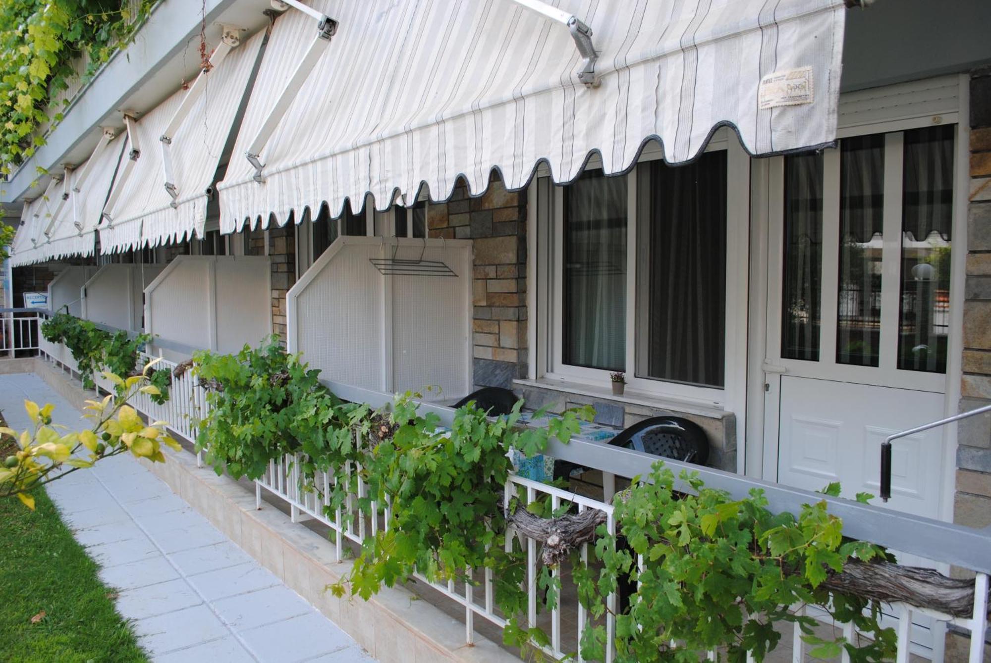 Artemis Apartments Paralia Dionysiou Bagian luar foto