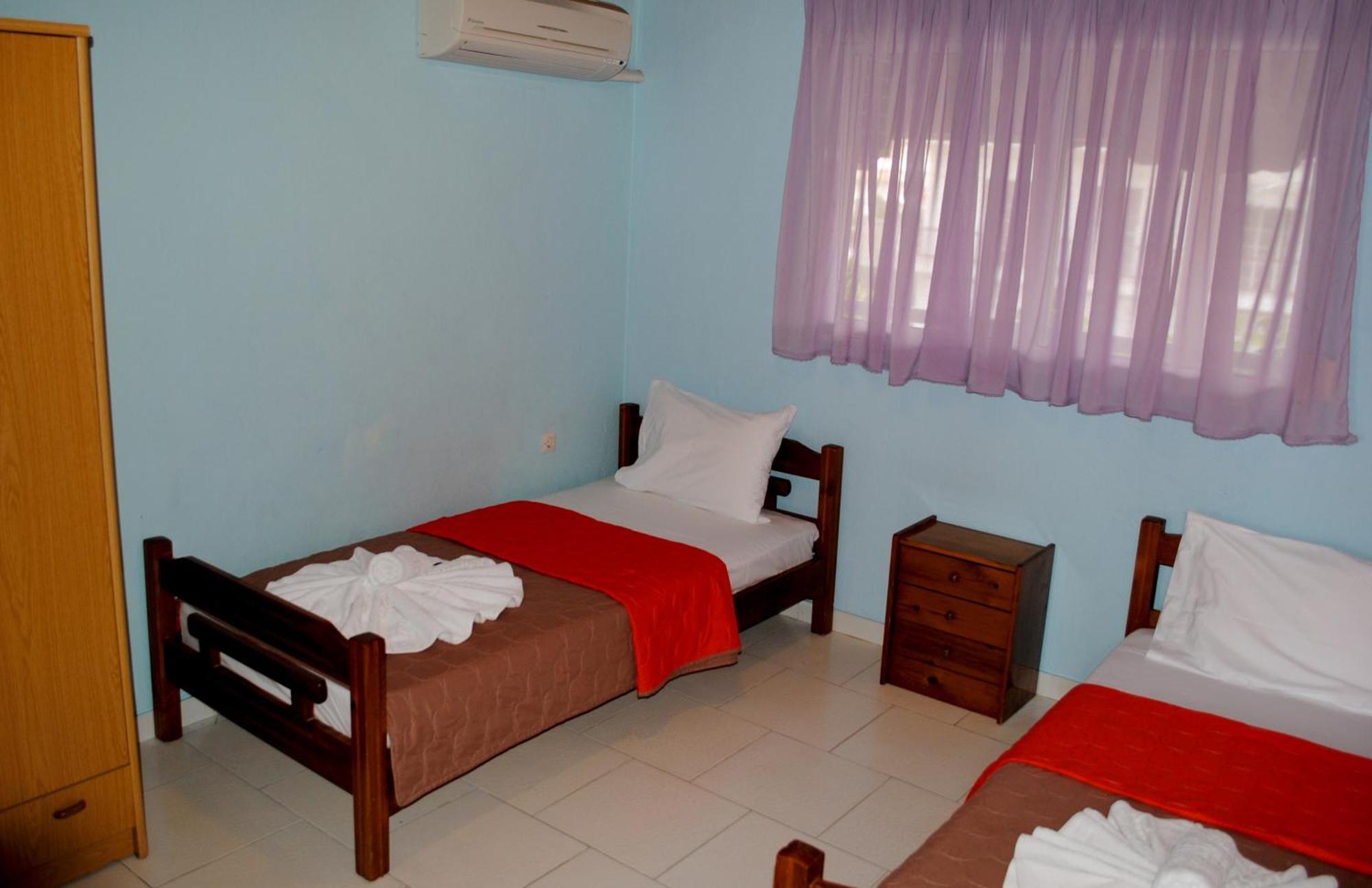 Artemis Apartments Paralia Dionysiou Bagian luar foto